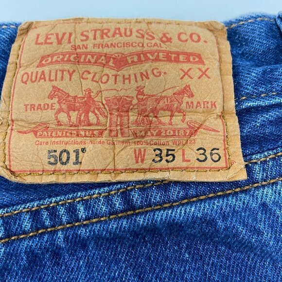 LEVIS | Distressed Denim Cut-Off Shorts - Picture 3 of 10